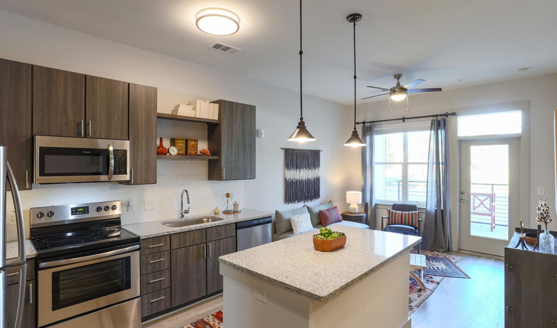 a kitchen with a stove and oven